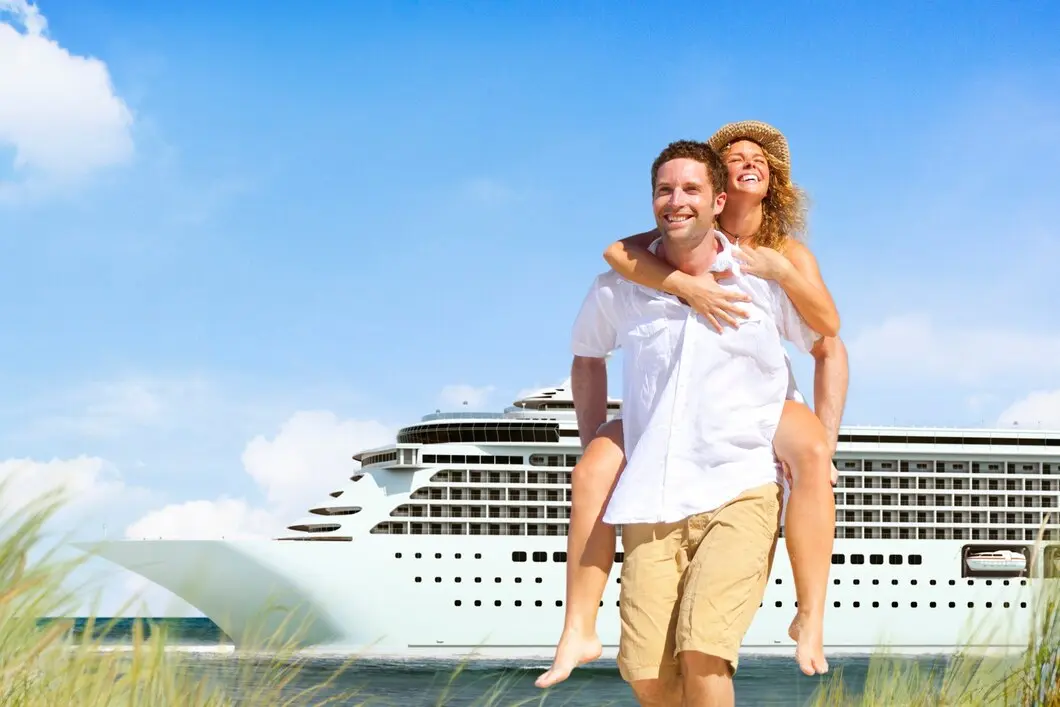 Man and woman enjoying a romantic beach vacation under the summer sky