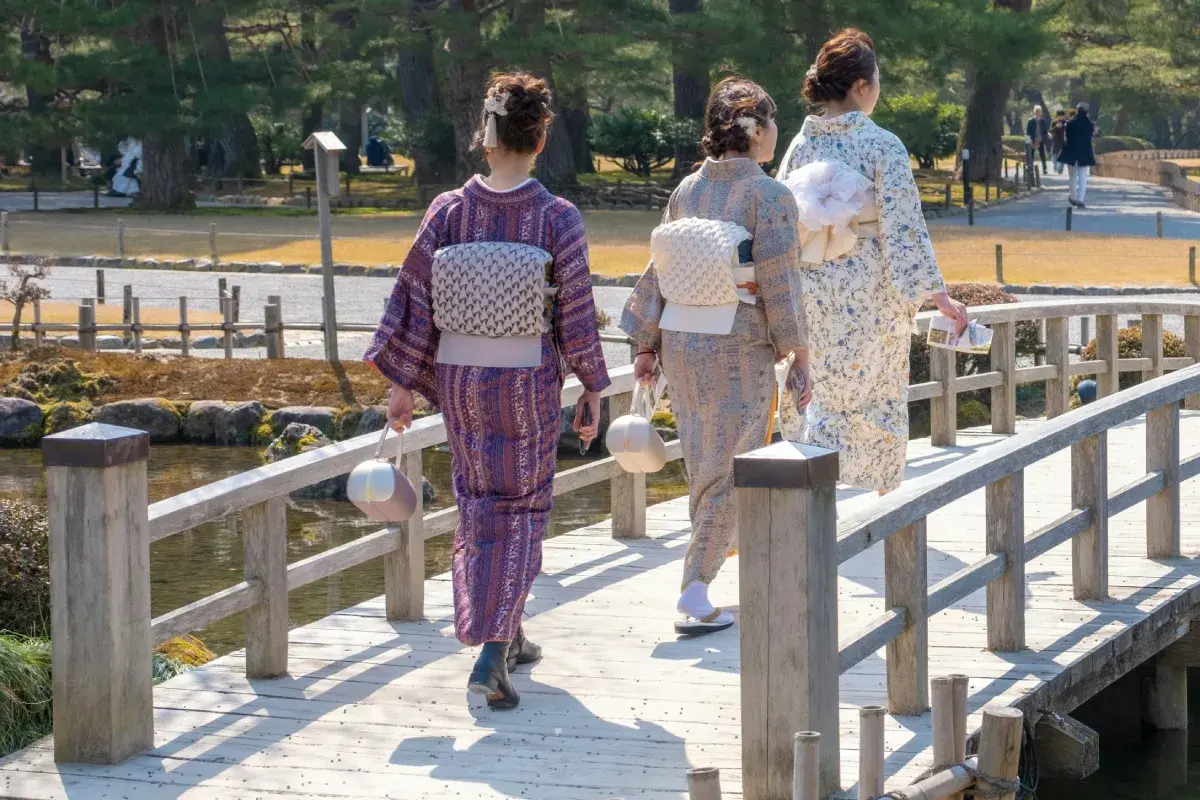Happy family enjoying outdoor recreation in the park during daylight