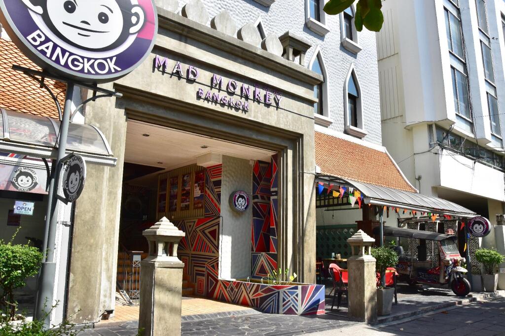 Urban city street with distinct architecture, thriving markets and restaurants