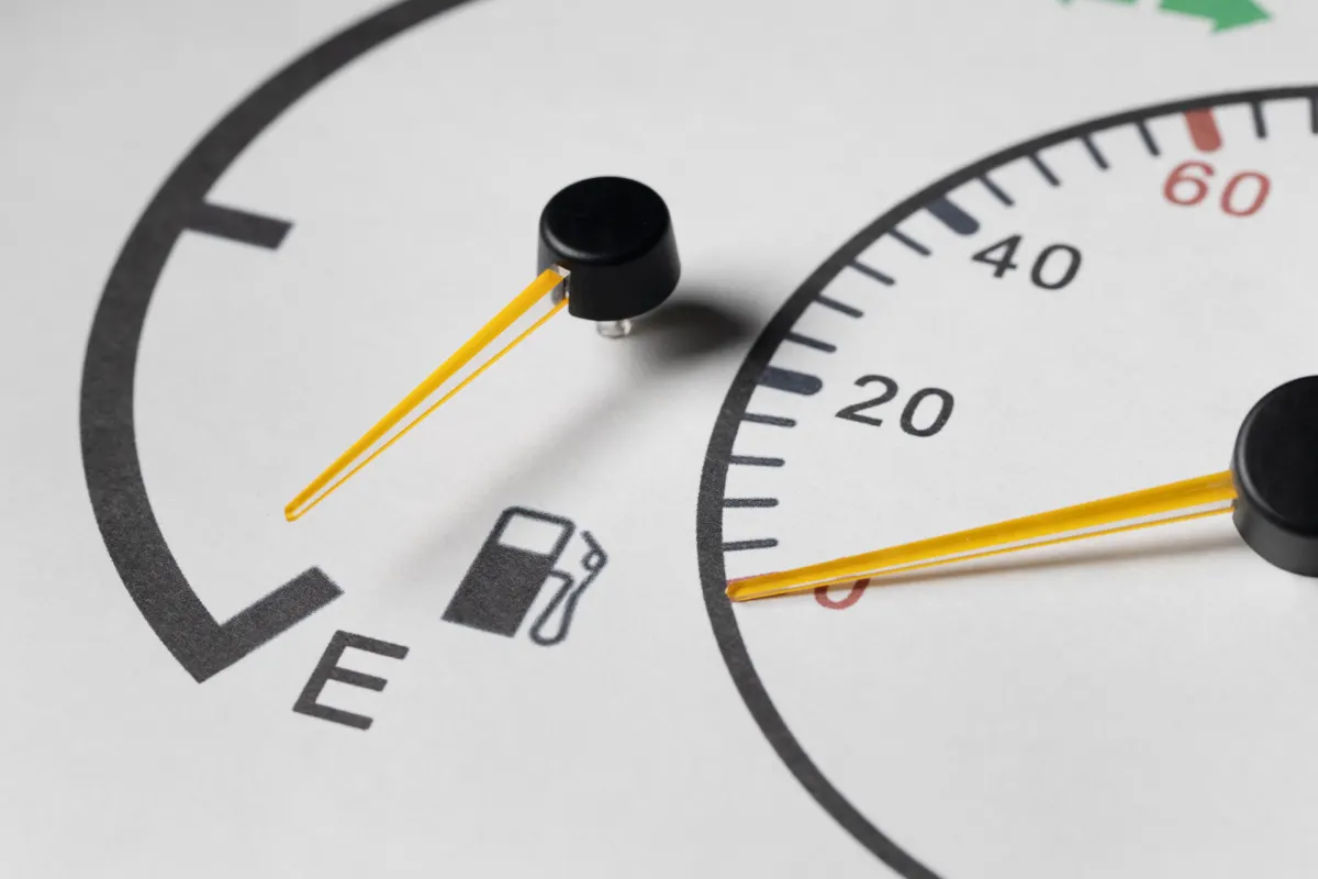 Close-up view of precise fuel gauge and speedometer.