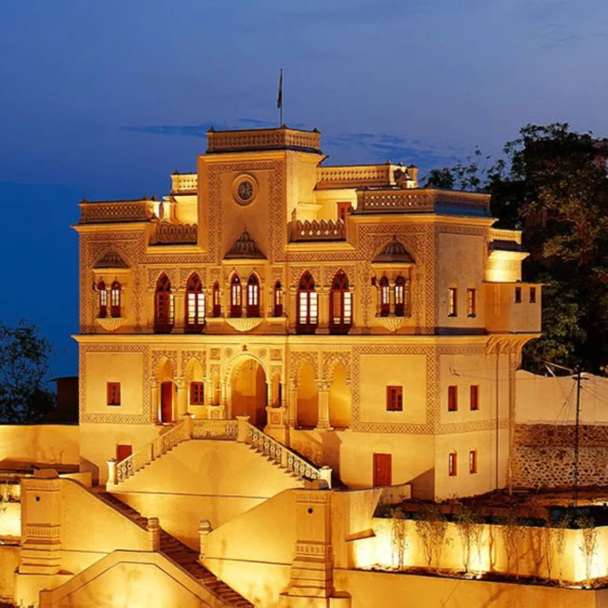 Ancient castle with traditional architecture during dusk in a city, no people around