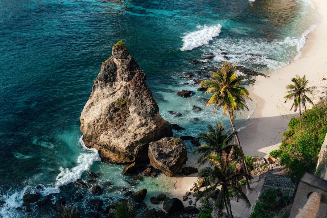 Turquoise sea meeting sandy beach landscape at a tropical island paradise, perfect for summer vacation
